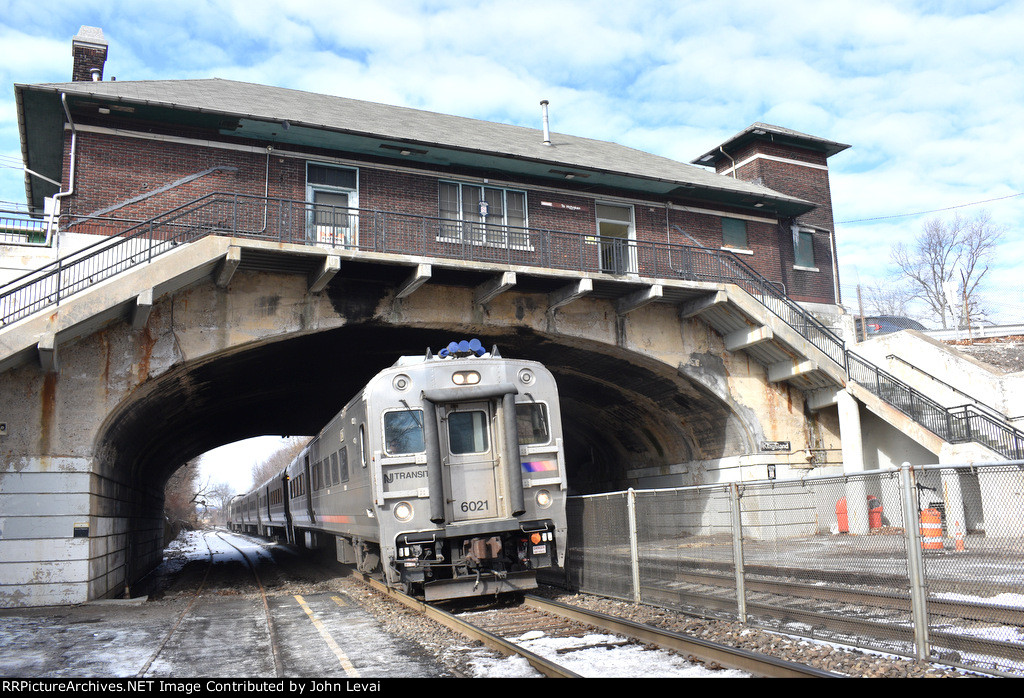 NJT Train # 1712 traveling beneath Ridge Rd and the former Lackawanna Kingsland station building on approach to the platforms